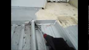 Roof repairs Sydney - metal flashing leaking on a kliplok roof in Surry Hills