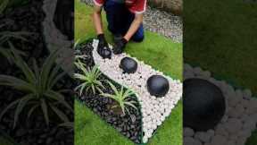 Low Maintenance Garden Design using black and white Pebbles and Rocks #gardenideas #diy #landscape