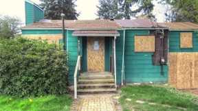 Flip this house!  Boarded up Seattle home up for sale at $450k