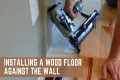 Installing a wood floor against the